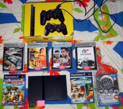 Suche Laptop bis 100 euro oder tausche meine PS2 mit viel zubehör